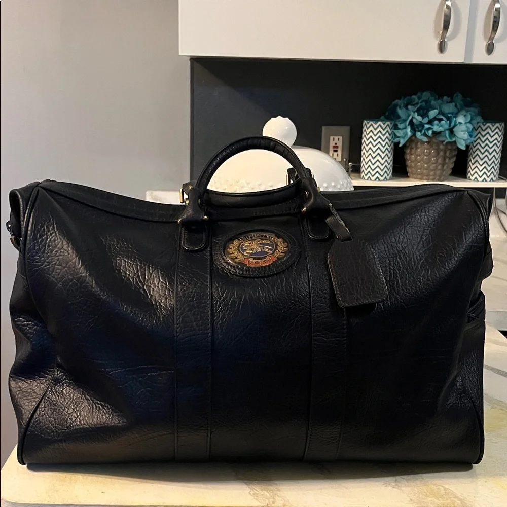 Burberrys Dark Navy Leather Bag with Embroidered Patch